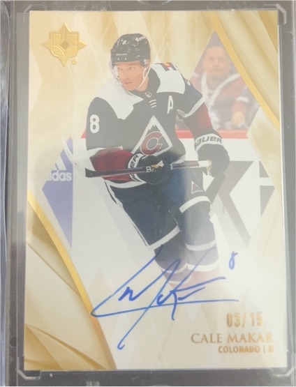 2023-24 Upper Deck Ultimate Collection Autographs Gold #8 Cale Makar — front