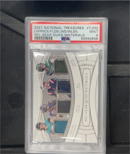 2021 Panini National Treasures #TJMZ Trevor Lawrence/Jackson Fields/Jonathan Jones/Zack Wilson NFL Gear Quad Materials — front