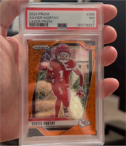 2024 Panini Prizm #399 Xavier Worthy Orange Lazer Prizm Rookie Card — front