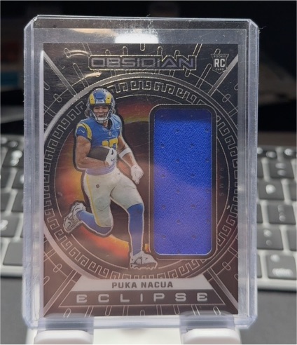 2023 Panini Obsidian Eclipse #ECL-PNA Puka Nacua — front