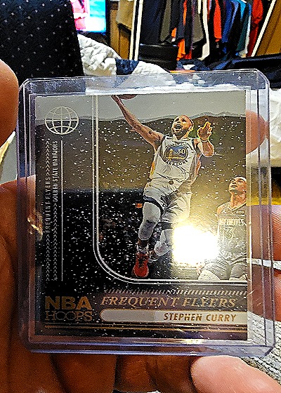 2024-25 Panini NBA Hoops #6 Stephen Curry Frequent Flyers Winter Parallel — front
