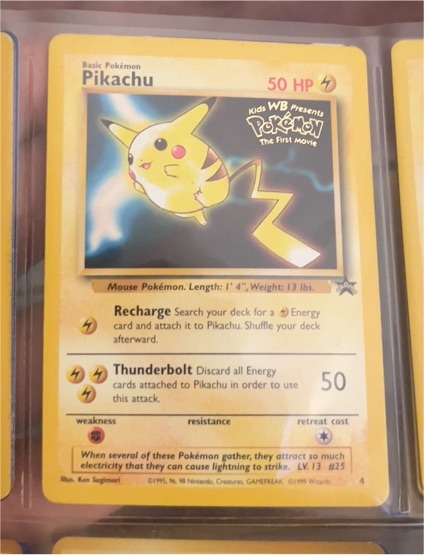 1999 Pokémon #4 Pikachu Black Star Promo The First Movie — front