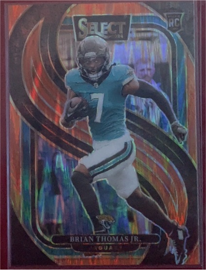2024 Panini Select #143 Brian Thomas Jr. Premier Level Red & Blue Prizm Shock Rookie Card — front