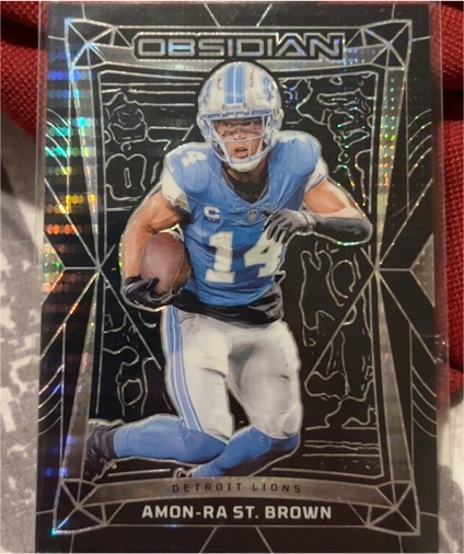 2024 Panini Obsidian Amon-Ra St. Brown — front