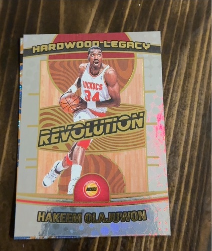 2024-25 Panini Revolution #19 Hakeem Olajuwon — front