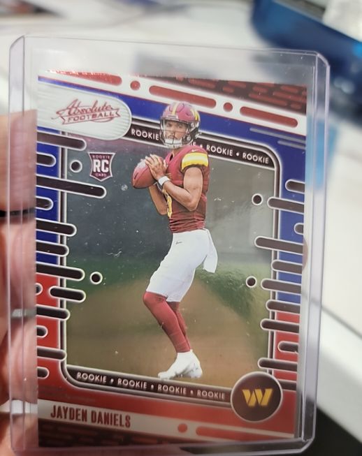 2024 Panini Absolute #102 Jayden Daniels Red and Blue Rookie — front
