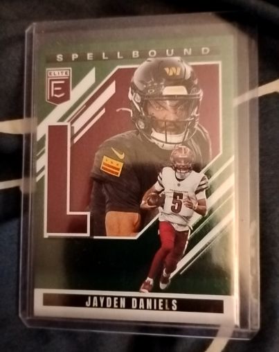 2025 Panini Donruss Elite Spellbound "L" Jayden Daniels — front