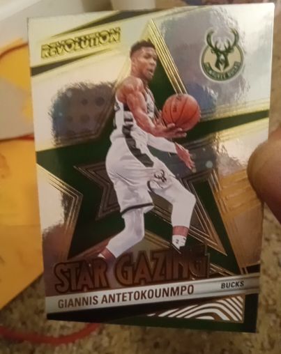 2024-25 Panini Revolution #12 Giannis Antetokounmpo Star Gazing — front