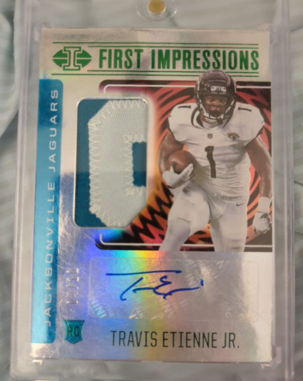2021 Panini Illusions First Impressions #114 Travis Etienne Jr. — front