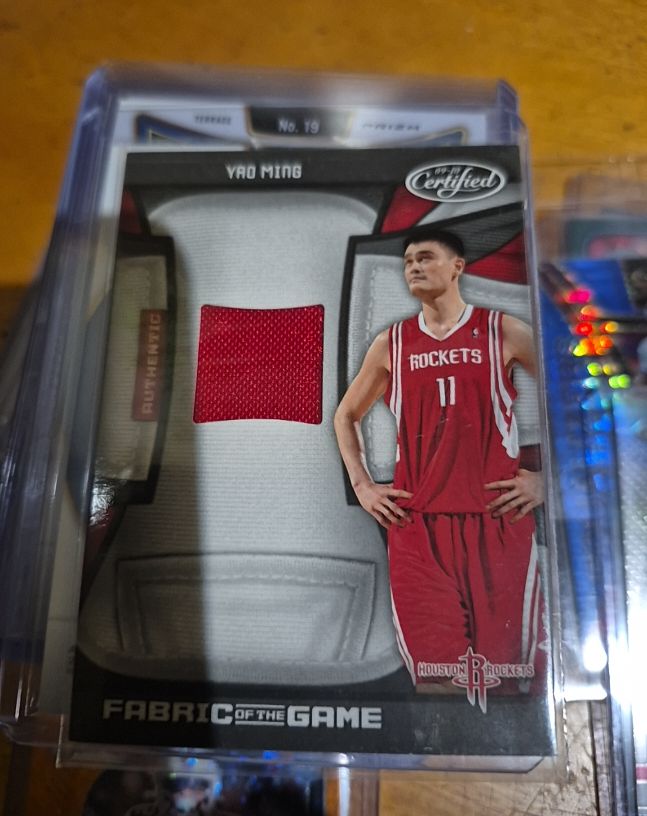 2009 Panini Certified Fabric of the Game #FOG-YM Yao Ming — front