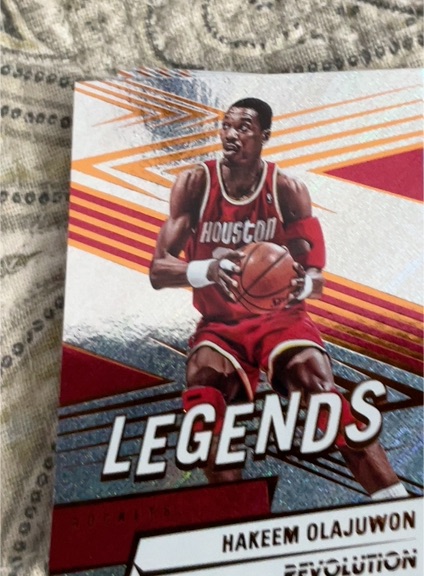 2024-25 Panini Revolution #168 Hakeem Olajuwon — front