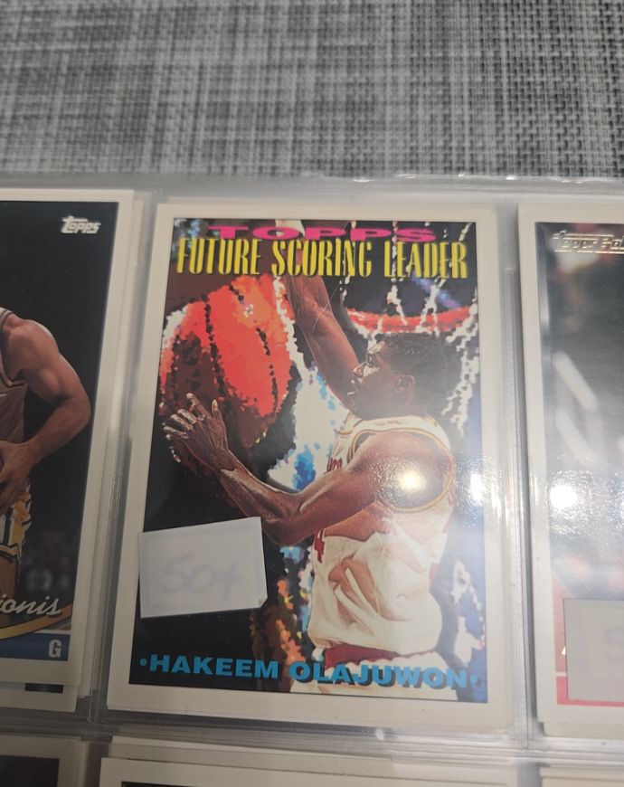1996-97 Topps Future Scoring Leader Hakeem Olajuwon — front
