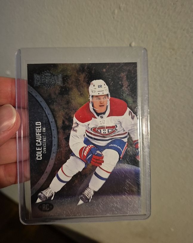 2021-22 Skybox Metal Universe #200 Cole Caufield Rookie — front
