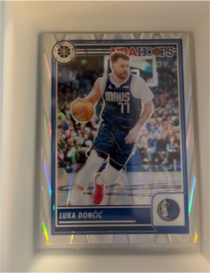 2023-24 Panini NBA Hoops Premium Stock #9 Luka Dončić — front