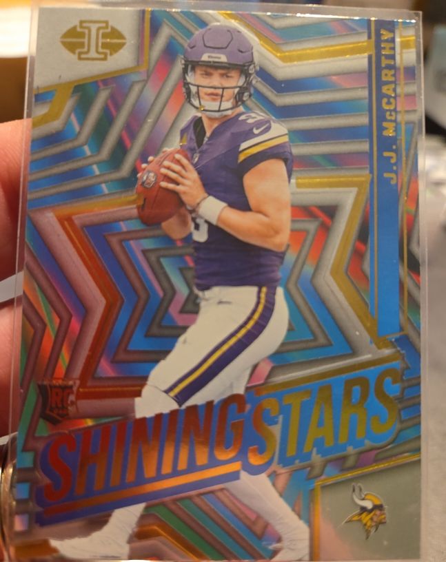 2024 Panini Illusions #8 J.J. McCarthy Shining Stars Rookie — front