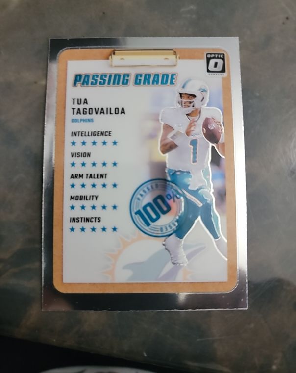 2024 Panini Donruss Optic Passing Grade #9 Tua Tagovailoa — front