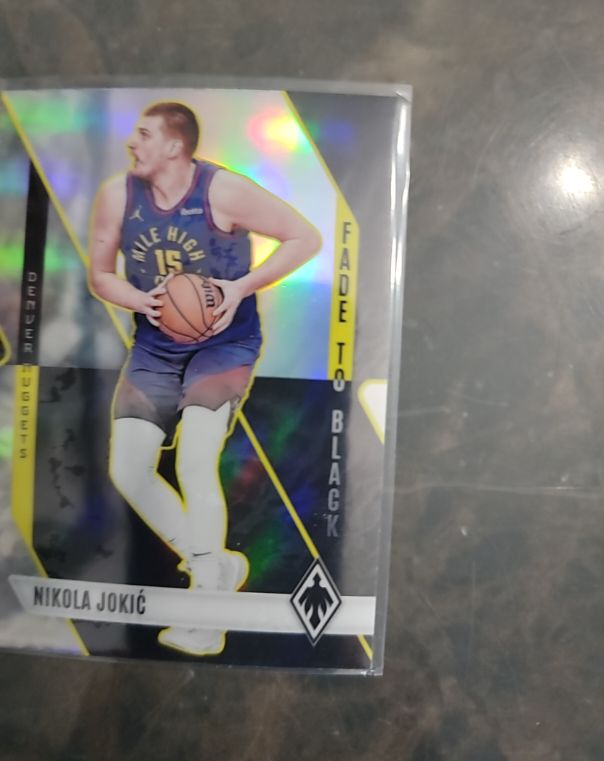 2023-24 Panini Phoenix #20 Nikola Jokić Fade to Black — front