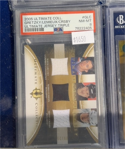 2005 Upper Deck Ultimate Collection #GLC Gretzky/Lemieux/Crosby Ultimate Jersey Triple — front