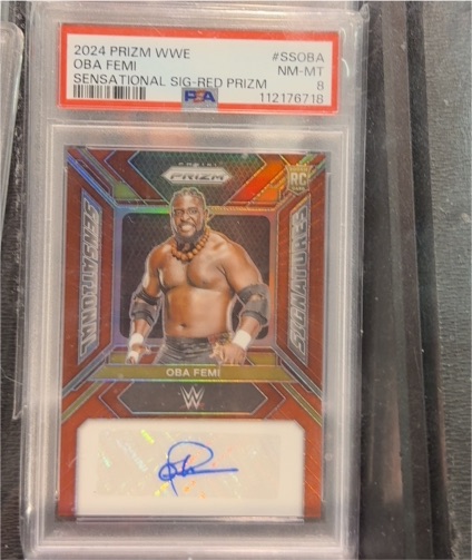 2024 Panini Prizm WWE #SSOBA Oba Femi Sensational Signatures Red Prizm — front