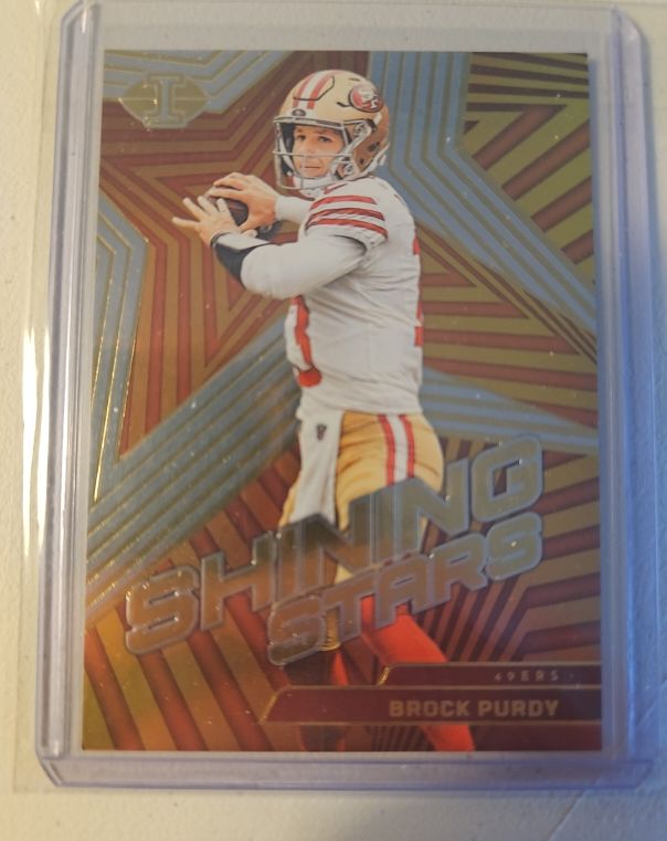 2023 Panini Illusions #2 Brock Purdy Shining Stars — front