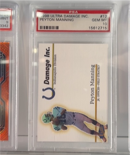 1998 Ultra Damage Inc. #12 Peyton Manning — front