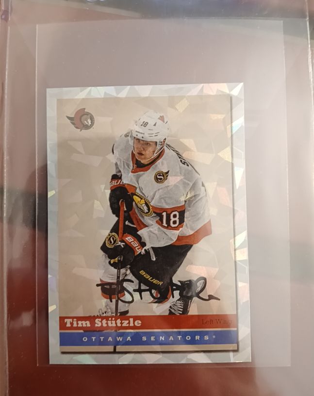2021-22 Topps NHL Stickers #610 Tim Stutzle — front