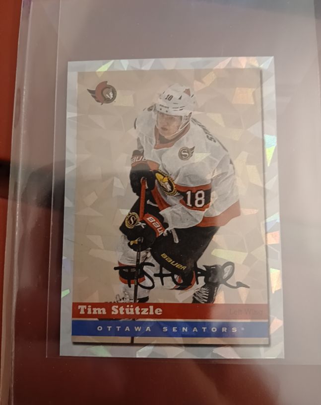 2021-22 Topps NHL Stickers #610 Tim Stutzle — front