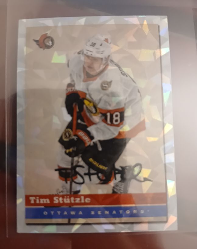 2021-22 Topps NHL Stickers #610 Tim Stutzle — front