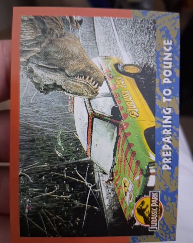 1993 Topps Jurassic Park #37 Preparing to Pounce — front