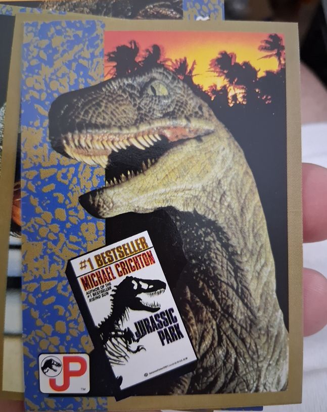 1993 Topps Jurassic Park #71 The Novel By Michael Crichton — front