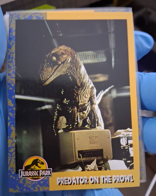 1993 Topps Jurassic Park Gold #63 Predator on the Prowl — front