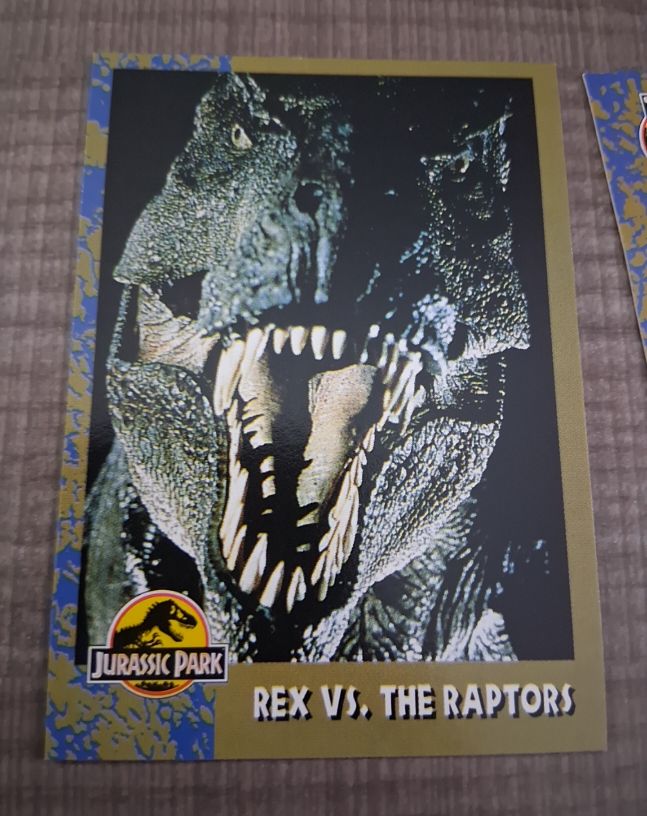 1993 Topps Jurassic Park #69 Rex vs. The Raptors — front