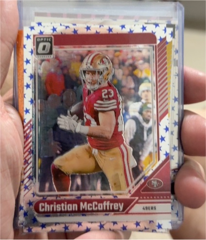 2024 Panini Donruss Optic #171 Christian McCaffrey Stars Prizm — front