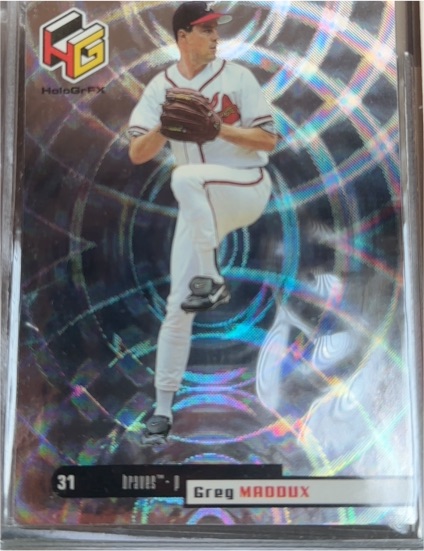 1999 Upper Deck HoloGrFX #7 Greg Maddux — front