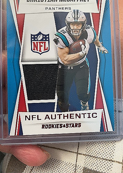 2021 Panini Rookies & Stars NFL Authentic #NA-CM Christian McCaffrey — front