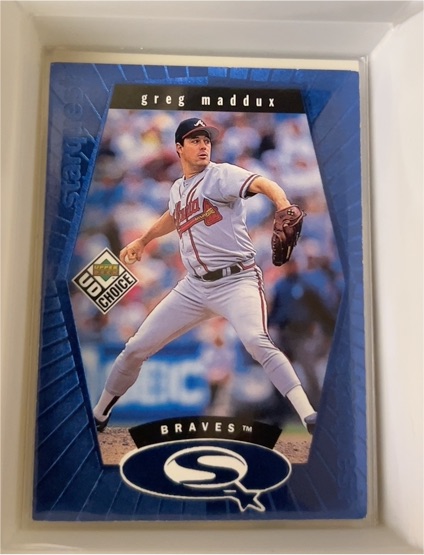 1999 Upper Deck UD Choice Starquest Blue #SQ11 Greg Maddux — front