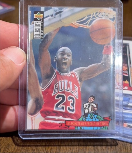 1994-95 Upper Deck Collector's Choice #402 Michael Jordan Dr. Basketball's World of Trivia — front