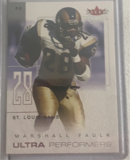 2004 Fleer Ultra Performers #4UP Marshall Faulk — front