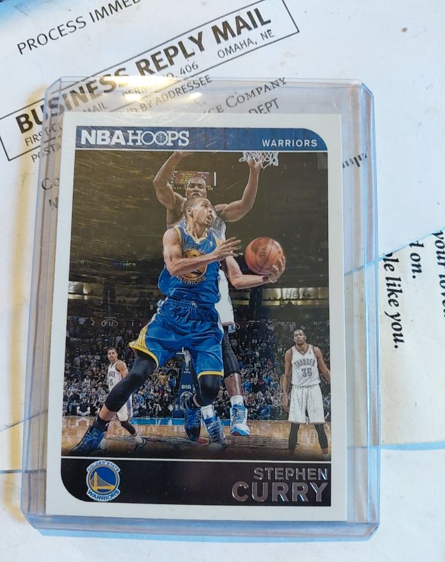 2014-15 Panini NBA Hoops #9 Stephen Curry — front