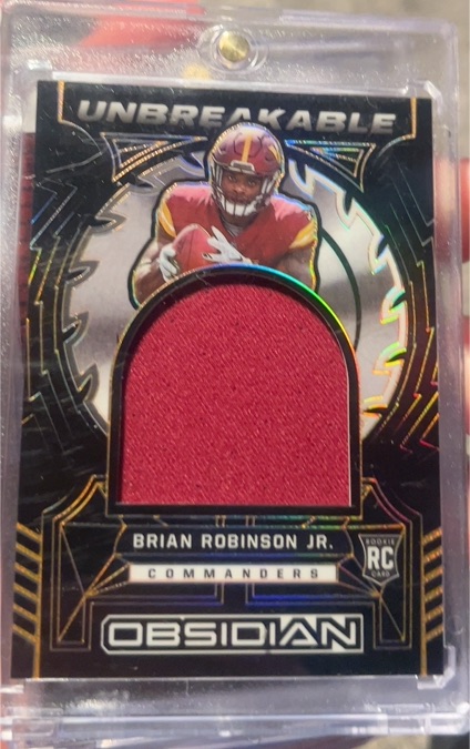 2022 Panini Obsidian Unbreakable #B159 Brian Robinson Jr. — front