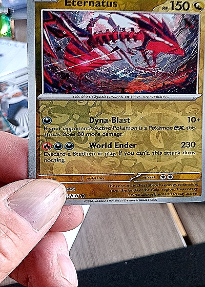 2021 Pokemon SV08 Surging Sparks #141 Eternatus — front