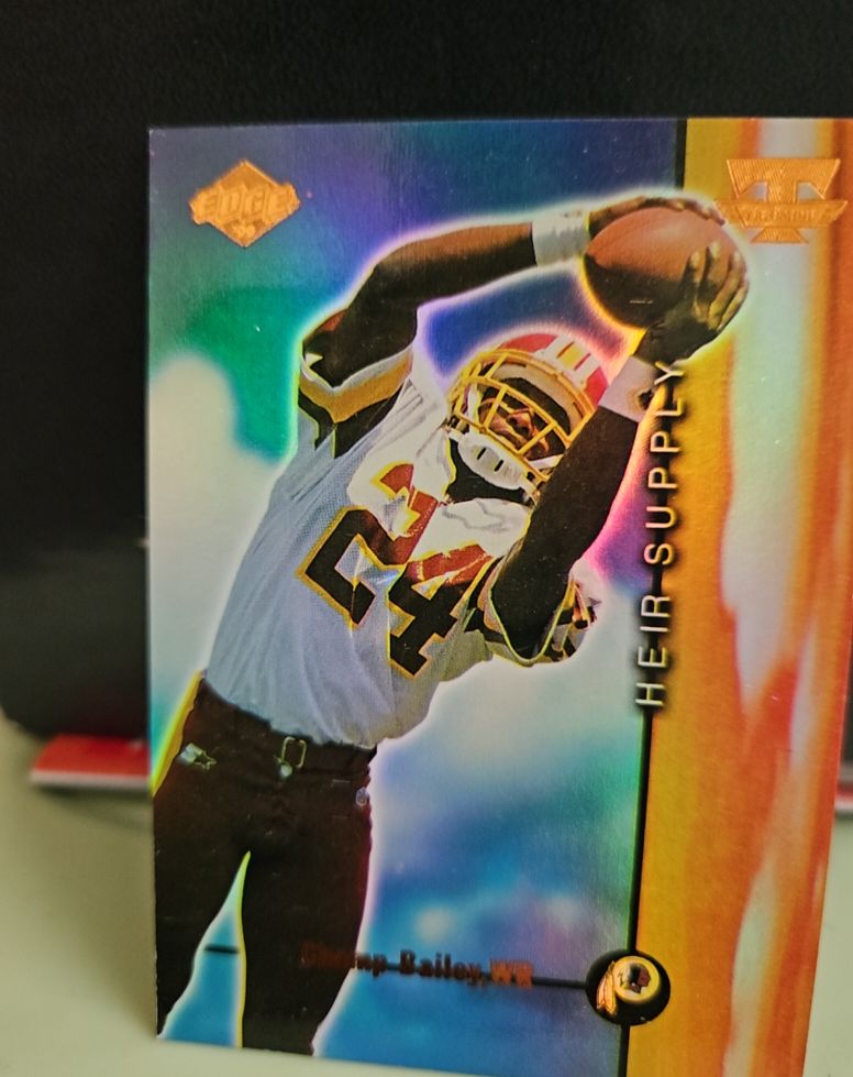 1999 Collector's Edge Triumph Heir Supply #HS12 Champ Bailey — front