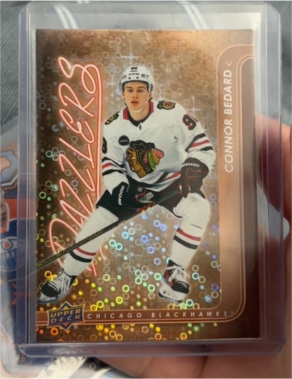 2024-25 Upper Deck Series 1 Dazzlers Orange #DZ-13 Connor Bedard — front