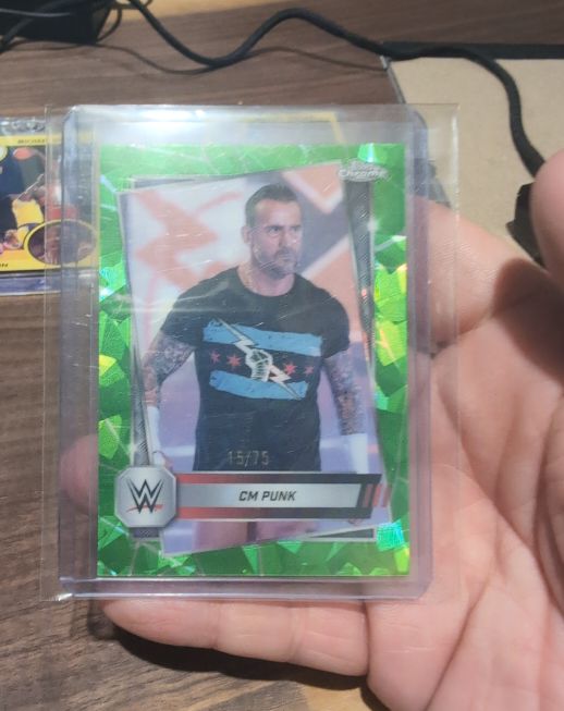 2025 Topps Chrome WWE #98 CM Punk Green Geometric Refractor — front