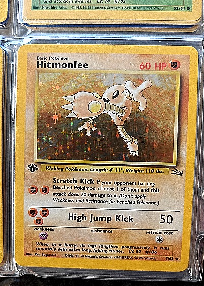 1999 Pokémon Fossil #7 Hitmonlee — front