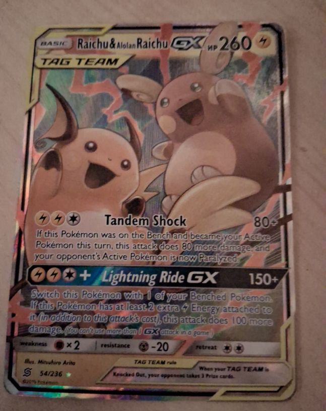2019 Pokémon TCG Unified Minds #54 Raichu & Alolan Raichu GX — front