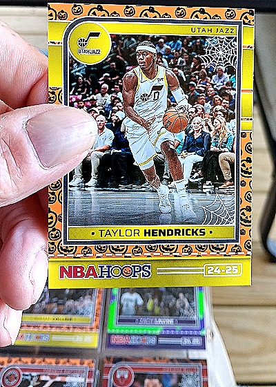 2024-25 Panini NBA Hoops Haunted Hoops Orange #87 Taylor Hendricks — front