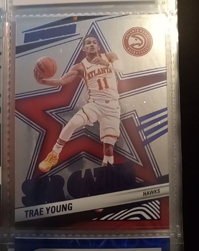 2024-25 Panini Revolution #8 Trae Young Star Gazing — front