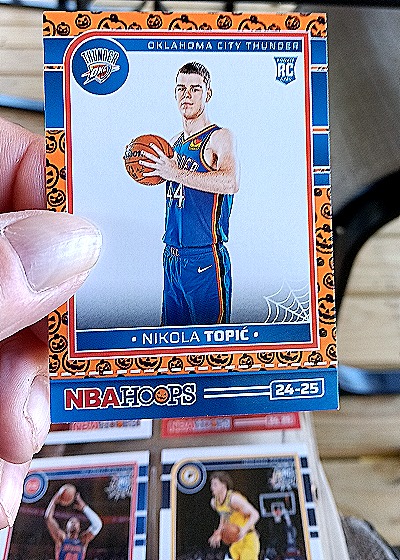 2024-25 Panini Haunted Hoops Orange Pumpkin #267 Nikola Topic — front