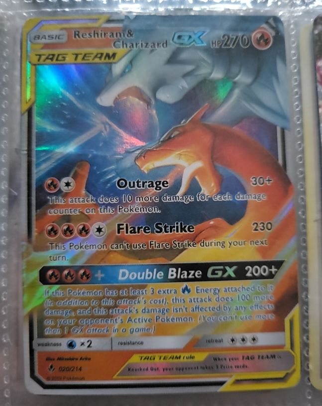 2019 Pokémon SM Unbroken Bonds #20 Reshiram & Charizard GX — front